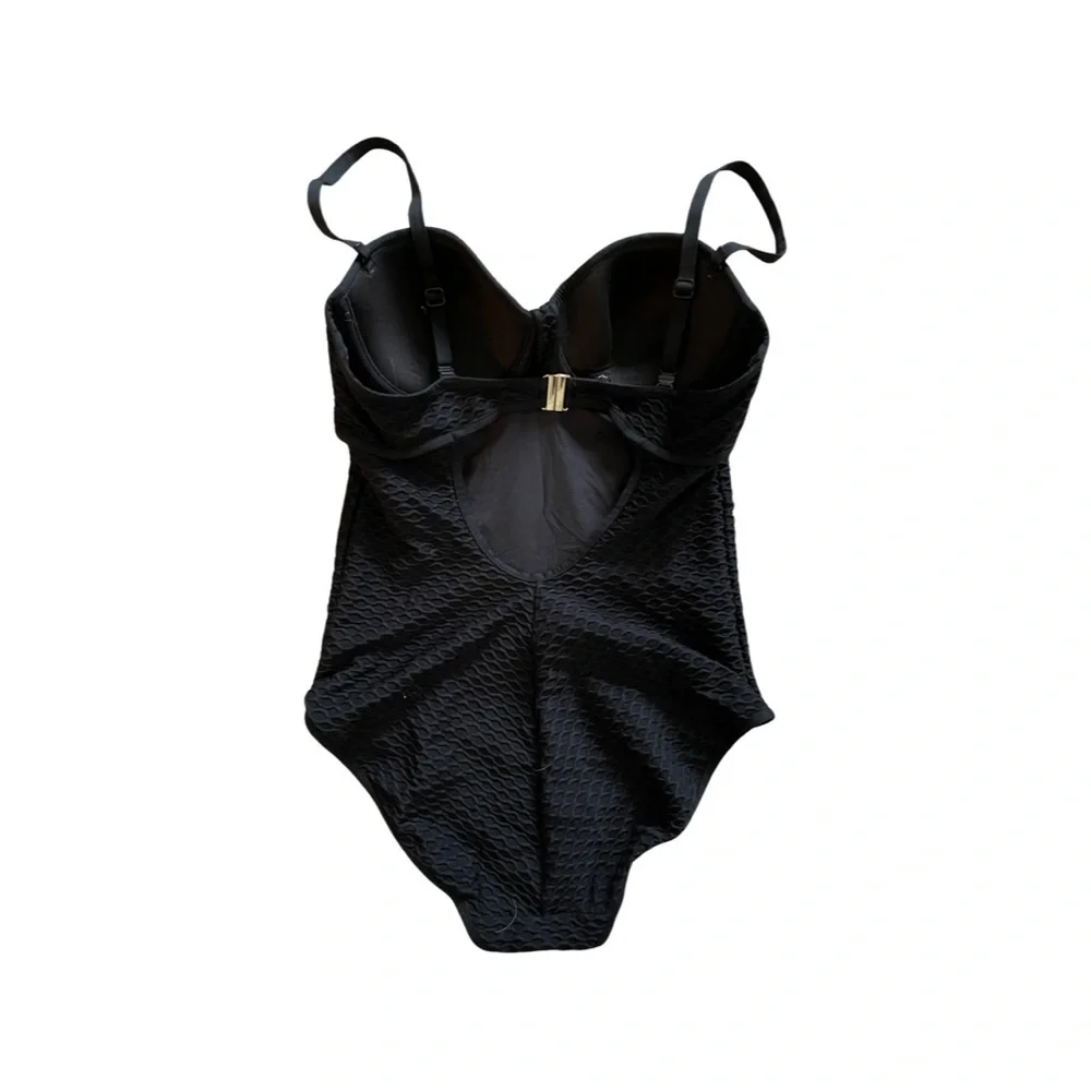 Black one piece with gold detail- no tag